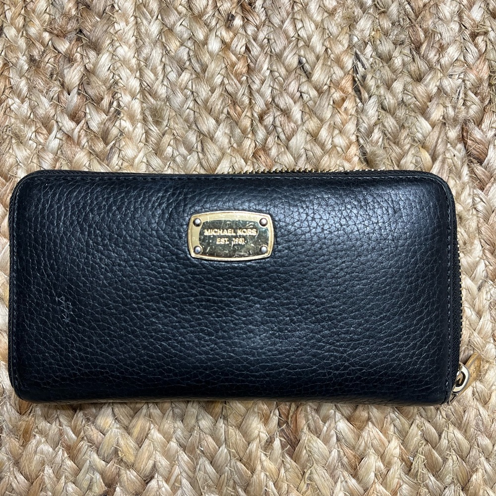 Michael Kors black wallet.
